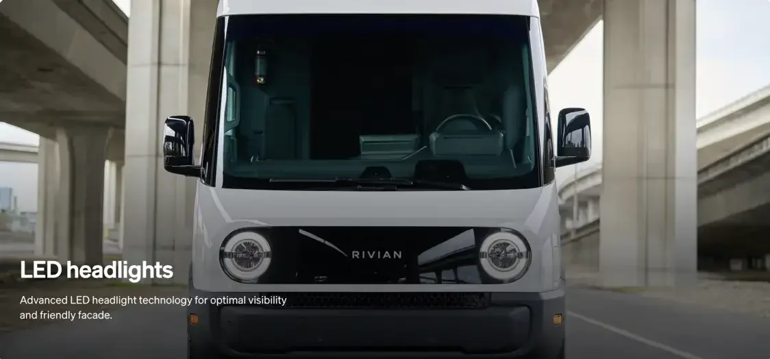 Rivian Commercial Van front view showing LED headlight design and aerodynamic body styling